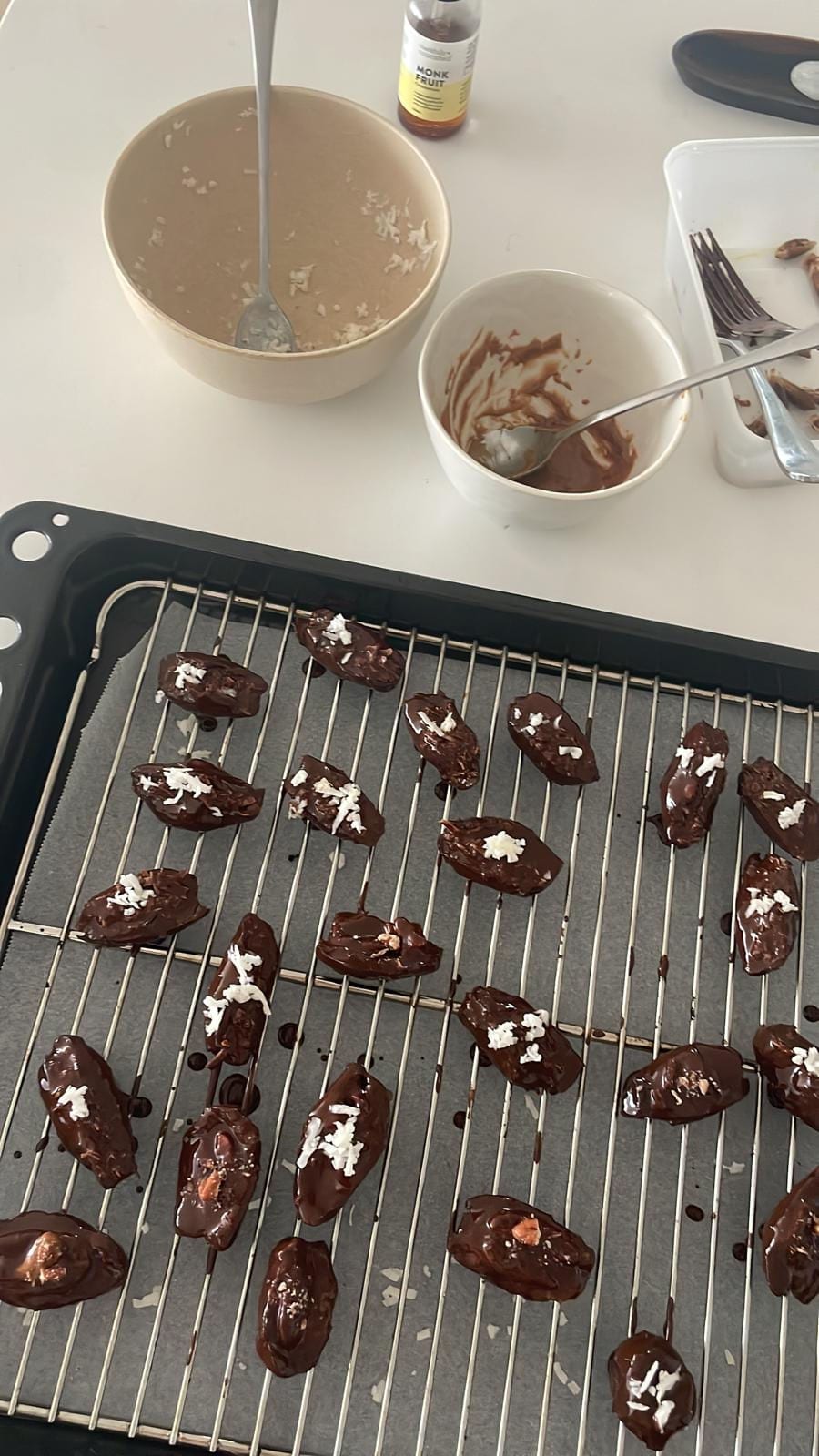 Medjool dates stuffed with coconut and drizzled with dark chocolate